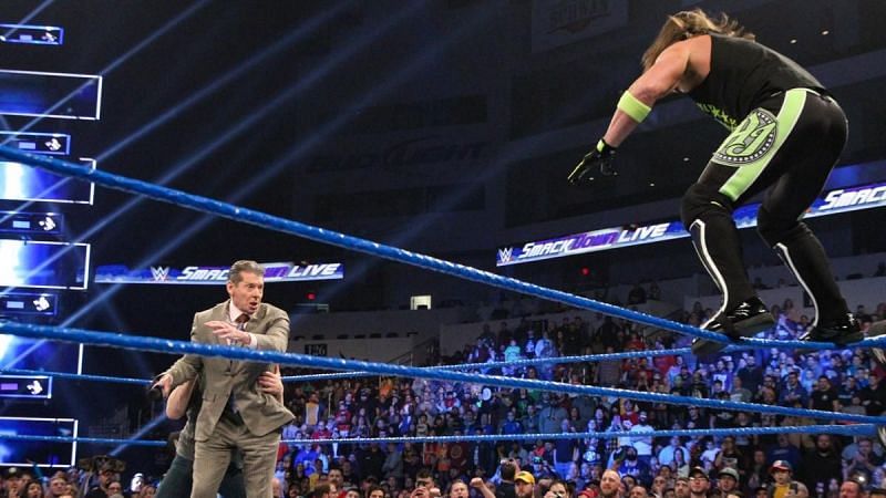 Bryan putting Mr. McMahon in the way!