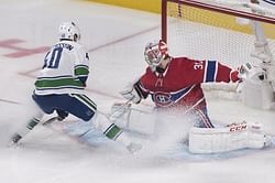Price makes 33 saves in return, Canadiens beat Canucks 2-0