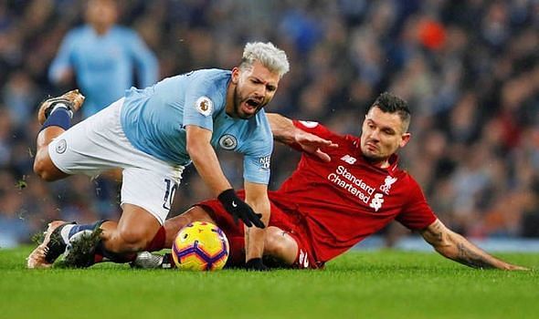 Lovren tackles Aguero for the ball during the Liverpool - Manchester City EPL game.