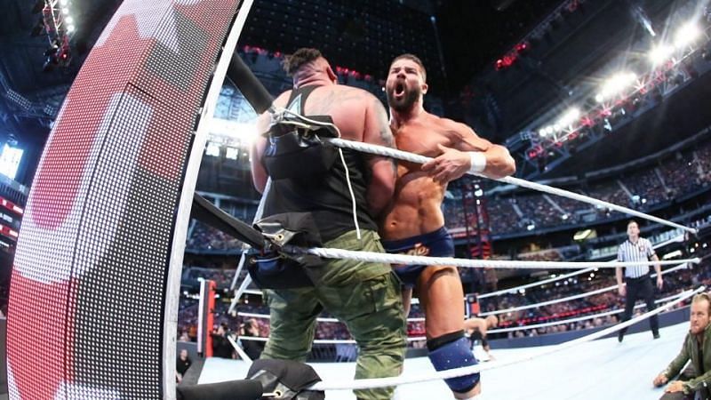 Roode attacks Rezar as Maverick looks on