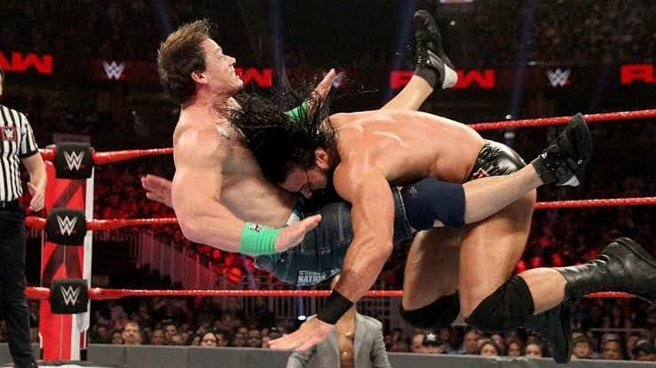 Cena and McIntyre in action