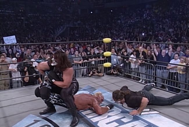 Sting puts Hollywood Hogan in the Scorpion Deatlock at Starccade 1997.