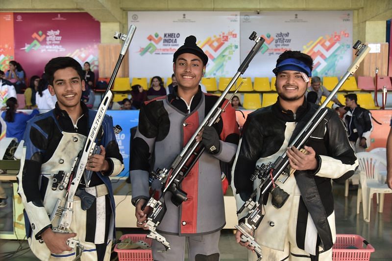 (L-R) Silver medallist Aishwarya Pratap Singh Tomar (MP) , Gold medallist Sartaj Singh Tiwana (Punjab) and Bronze medallist Harshit Binjwa (MP) during Boys under-21 3-position rifle event at Khelo India Youth Games