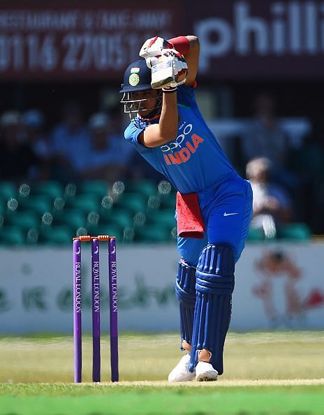 Gill driving one through the covers against England Lions during a Tri-Series match in 2018