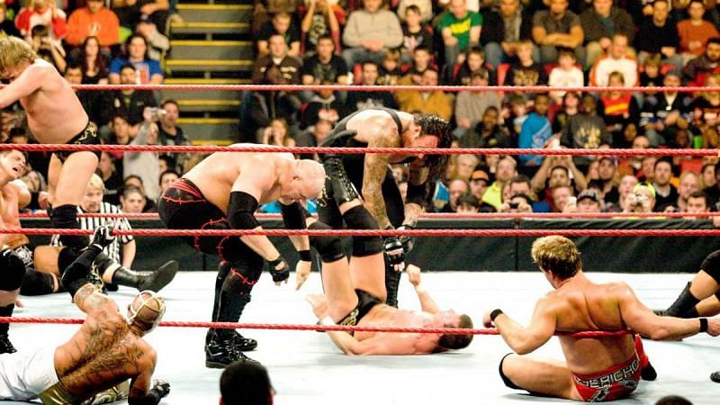 Jericho watches Kane and the Undertaker chokeslam Ted DiBiase in the 2009 Royal Rumble