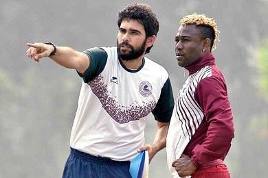 Khalid Jamil (left) instructing Mohun Bagan's Sony Norde