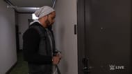 Jimmy Uso knocking on Mandy's hotel room door