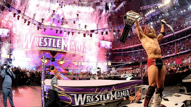 Bryan celebrates as WWE World Heavyweight Champion.
