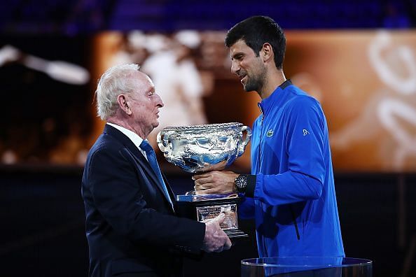 Rod Laver and Novak Djokovic share a moment during an event at the Australian Open 2019 on Monday