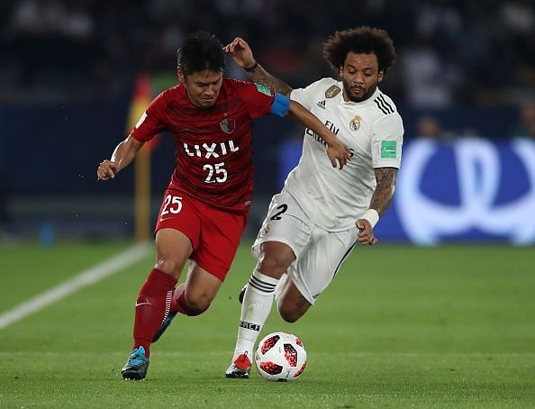 Marcelo attacking the ball during a FIFA Club World Cup game.