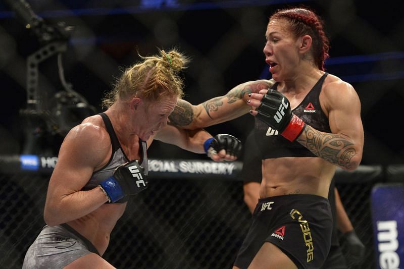 Holly Holm and Cris Cyborg in action during their UFC 219 main event display!