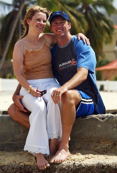 Glenn McGrath of Australia with wife Jane on the beach