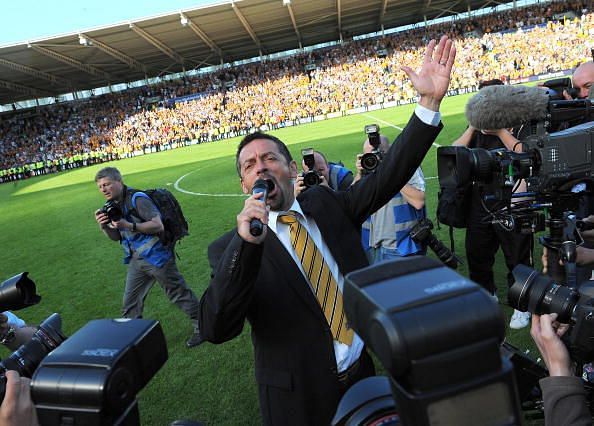 Brown celebrating with Hull City fans in May 2009 after securing Premier League survival