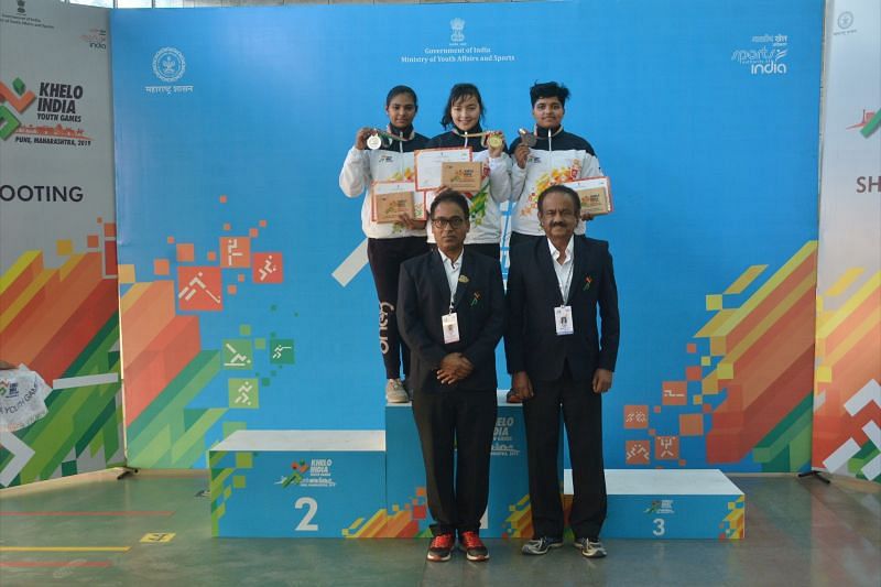(L-R) Anjali Choudhary (HR), Devanshi Rana (DL) and Abhidnya Ashok Patil (MH) during the medal ceremony of girls U-21 25m pistol competition at Khelo India Youth Games