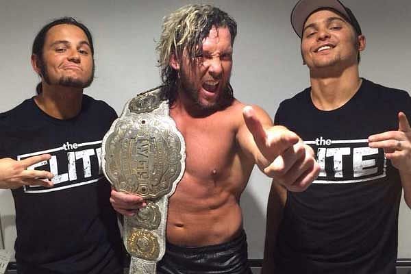 Kenny Omega flanked by the Young Bucks, Matt and Nick Jackson.