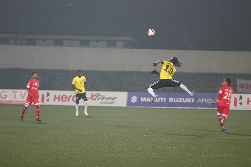 Real Kashmir&#039;s Bazzie Armand gets a free header in the centre of the part against Shillong Lajong