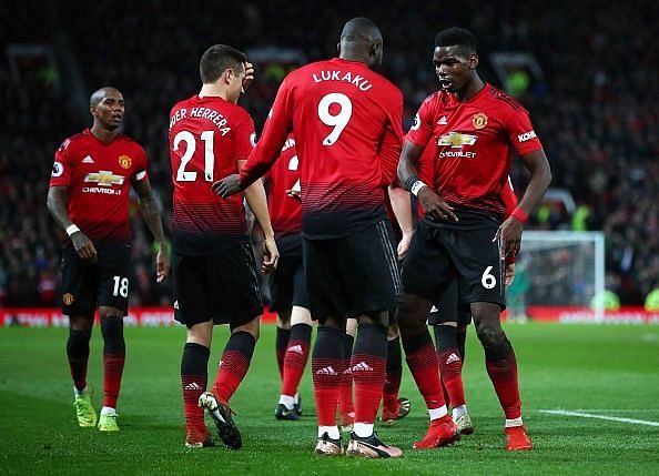 Manchester United players celebrating a goal