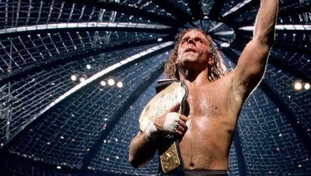 The Heart Break Kid basks in the glow of championship victory inside the Elimination Chamber