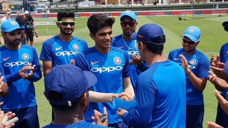 Shubman Gill receiving his cap from former Indian skipper MS Dhoni