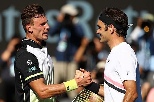 Federer and Fucsovics at 2018 Australian Open - Day 8