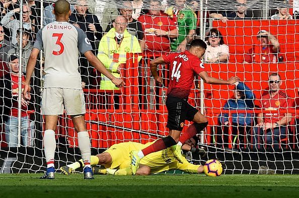Alisson Becker made a big save to deny Jesse Lingard in the first half
