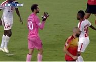 East Bengal goalkeeper Rakshit Dagar collects the ball but Aizawl's Ansumana Kromah is standing just in front of him preventing him to release the ball (Credit - Hotstar)