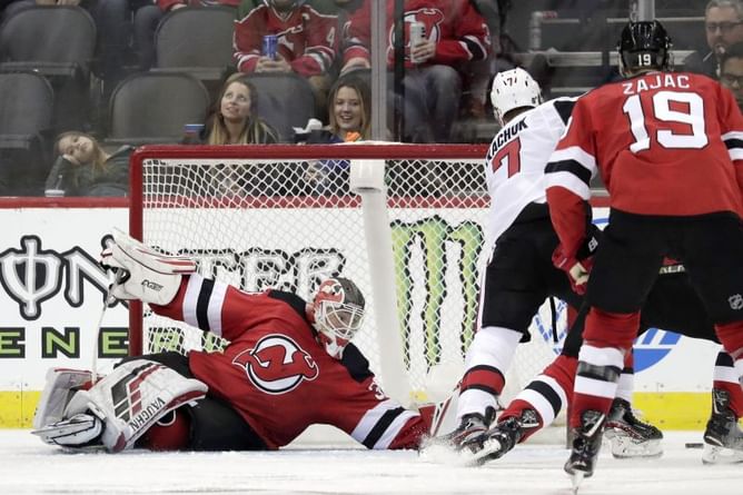 Schneider makes 30 saves as Devils beat undermanned Ottawa