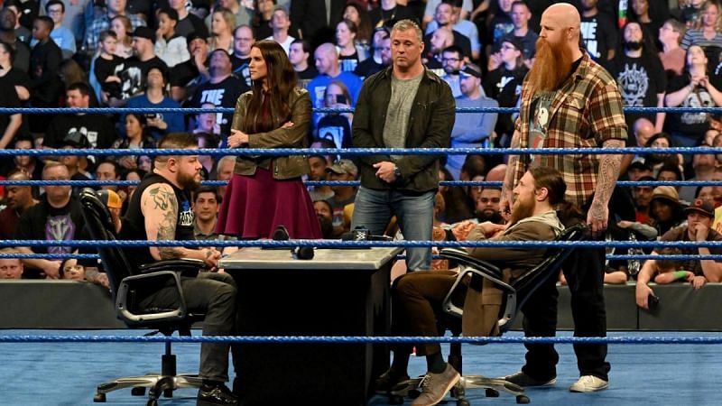 Kevin Owens and Daniel Bryan during contract signing.