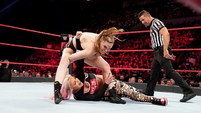 A fired-up Ronda Rousey squashed two Riott Squad members this Monday