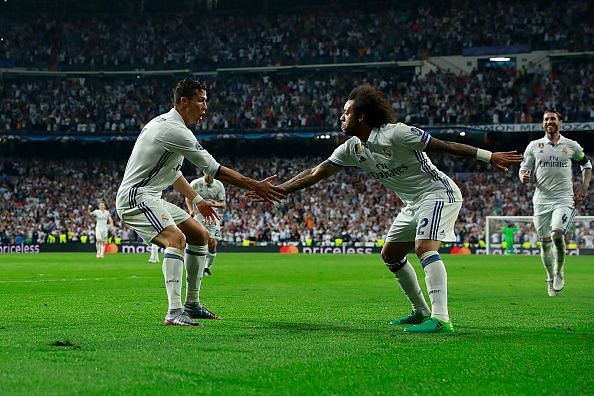 Cristiano Ronaldo and Marcelo doing their iconic celebration