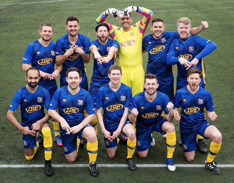 Owner Spencer Owen (back row, third from left) with Hashtag United