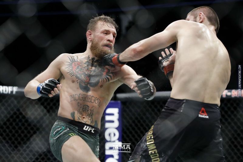 Conor McGregor launches himself at Khabib Nurmagomedov at UFC 229