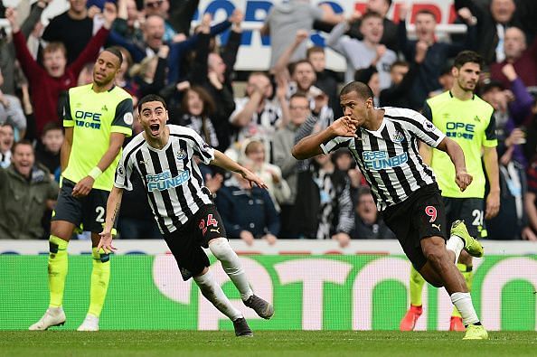 Miguel Almiron celebrates against Huddersfield Town As Newcastle move towards safety