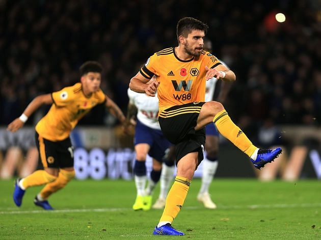 Ruben Neves playing the ball in