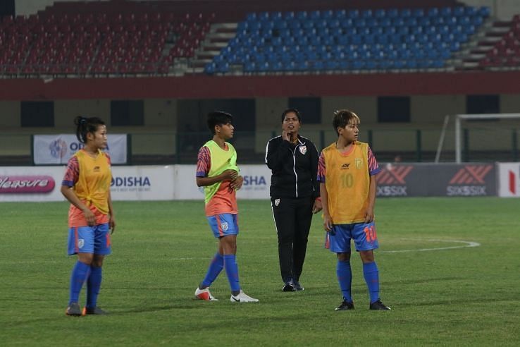 Coach Maymol Rocky (second from right) with players of the Indian Women&#039;s Football Team
