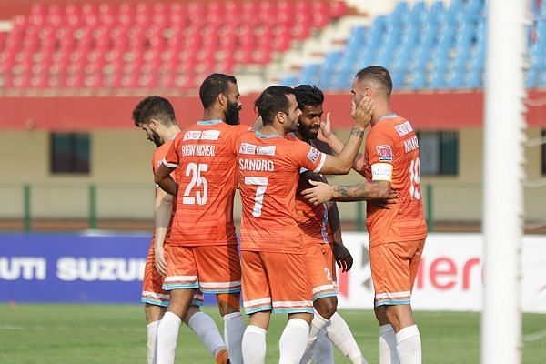 Chennai City players celebrate Vijay&#039;s goal against Indian Arrows