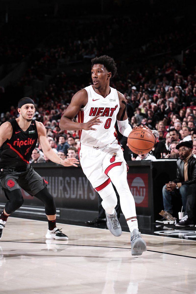 Josh Richardson of the Miami Heat drives to the lane past Seth Curry of the Portland Trail Blazers