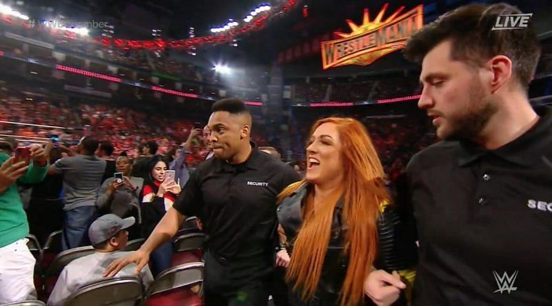 Becky Lynch invaded the Elimination Chamber to attack Ronda Rousey and Charlotte.