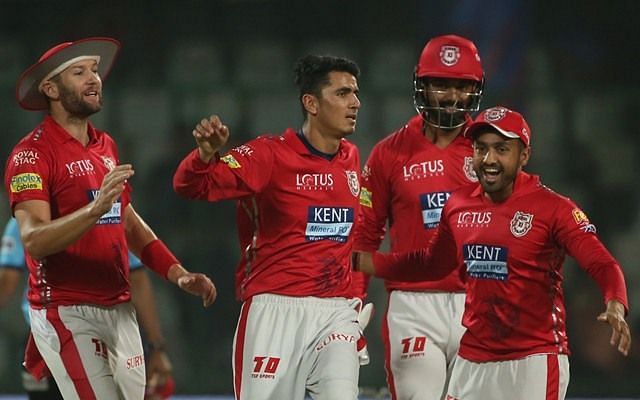 Mujeeb celebrates with his teammates after picking up Rishabh Pant&#039;s wicket.