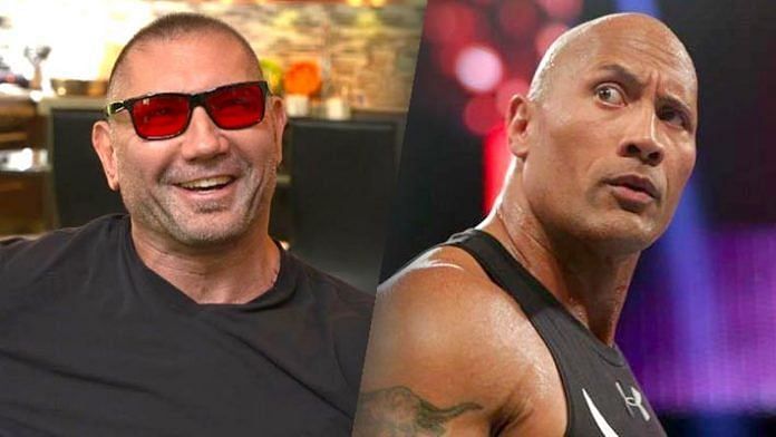 Batista lets the Rock and John Cena have it.