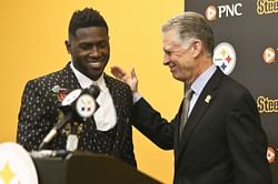 Brown meets with Rooney, saying 'it is time to move on'