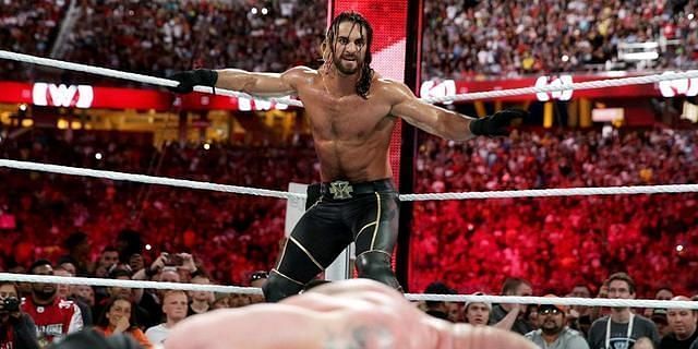 Seth Rollins preparing for a Curb Stomp on Brock Lesnar at Wrestlemania 31.