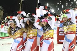 Switzerland beats rival Austria for gold in team event