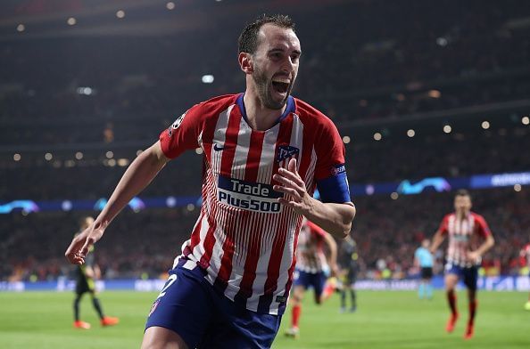 Diego Godin celebrates after scoring his goal