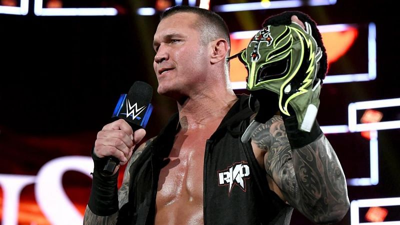 Randy Orton lays claim to Rey Mysterio&#039;s mask after a brutal beatdown