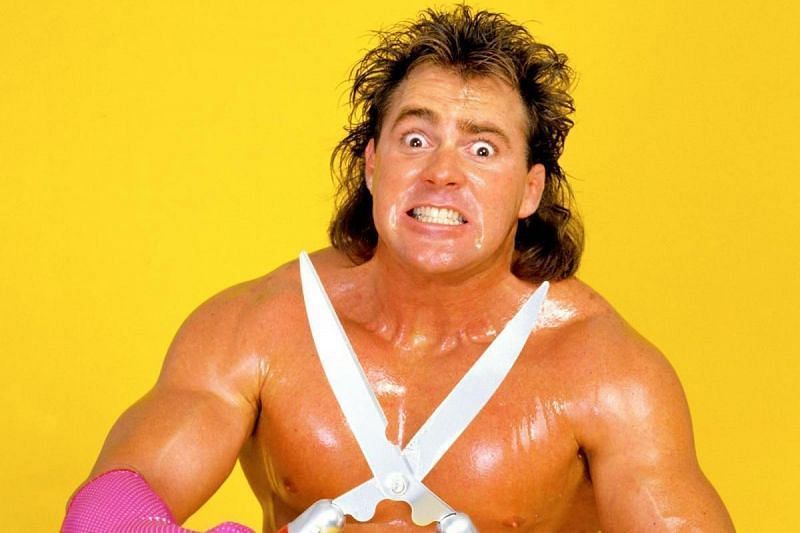 Seriously...who in their right mind would let this man cut their hair? (Brutus The Barber Beefcake.)