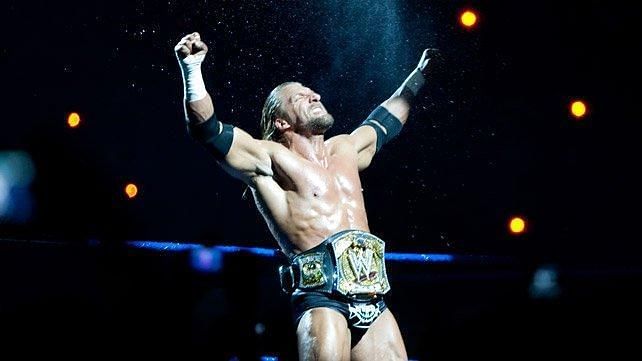 Triple H wearing the title belt