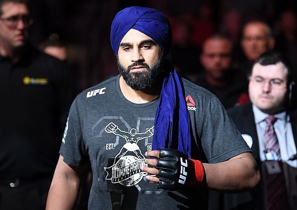 Arjan Singh Bhullar makes his way to the Octagon in his Turban