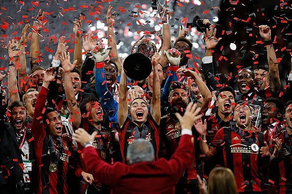 Atlanta players celebrate winning the 2018 MLS Cup, just a season after the club's inception