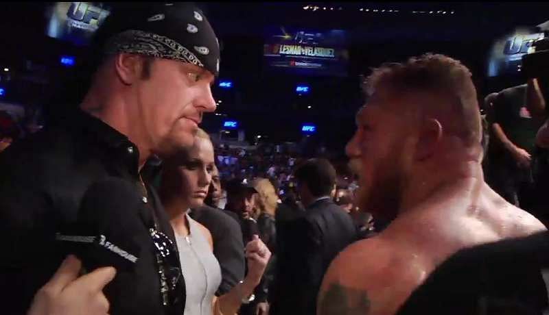 The Undertaker got speculation running wild when he showed up at UFC 121.